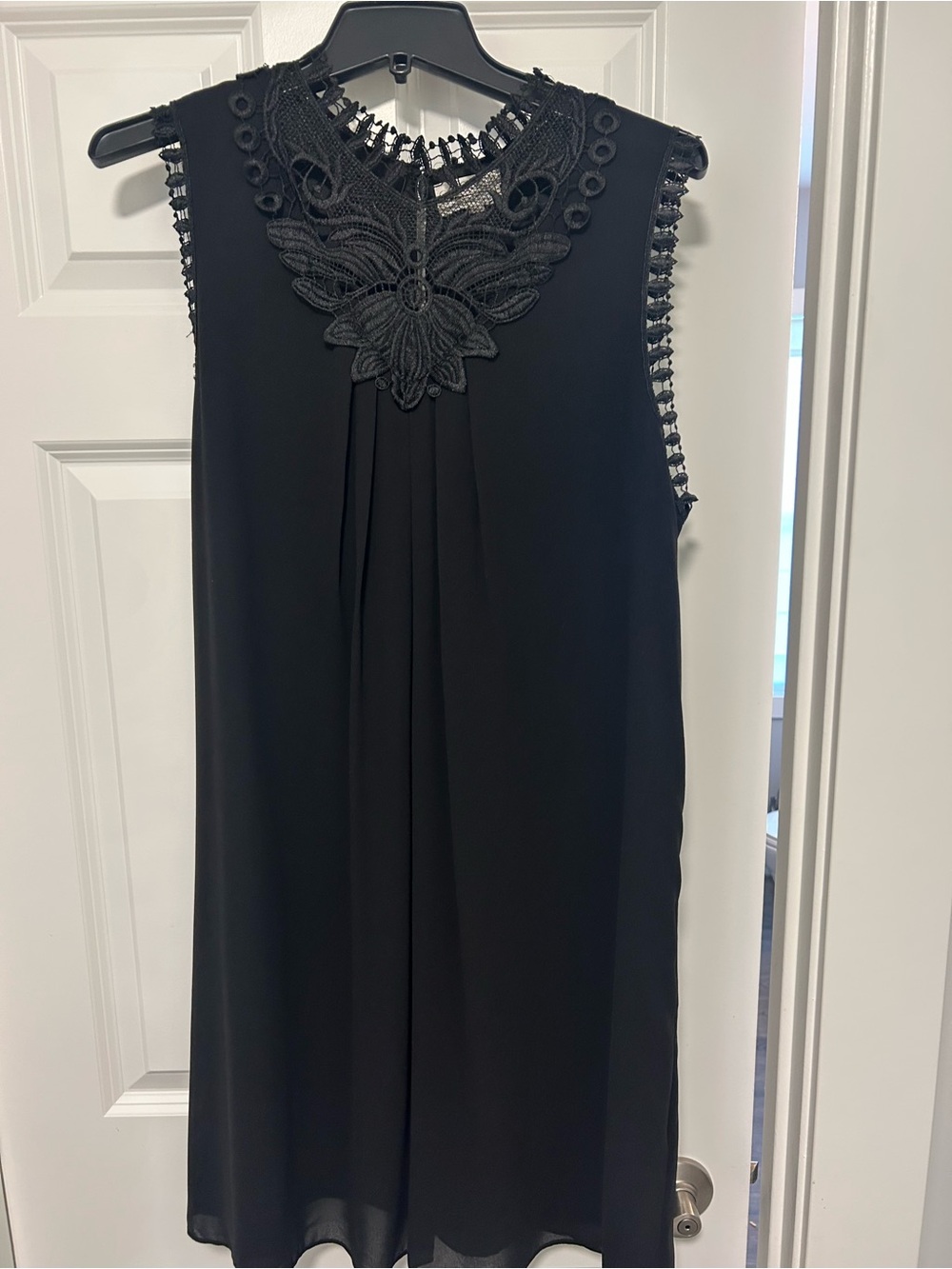 Elegant Black Sleeveless Mini Dress with Crochet Yoke